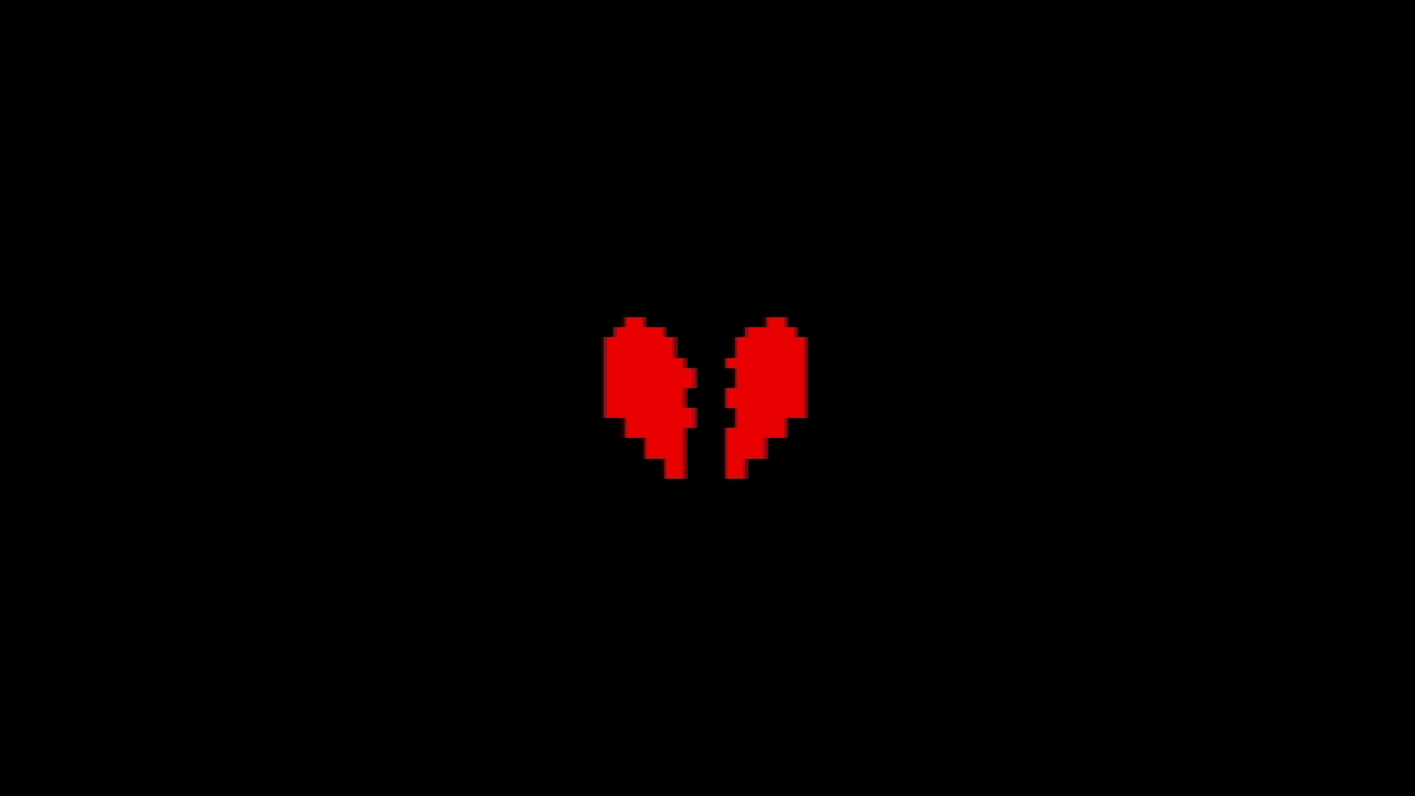 En jeu : l'âme rouge s'est fendue en deux, seule dans le noir.